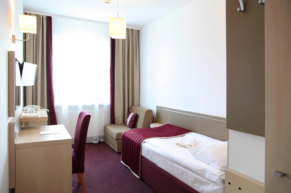 Arche Hotel Siedlce Kamer foto