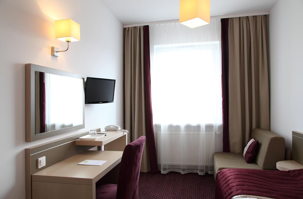 Arche Hotel Siedlce Kamer foto